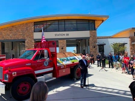Speaker at podium during memorial beam ceremony